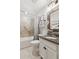 Bathroom features a tub with tile surround and a granite countertop vanity at 2470 Crimson Downs Dr, Cumming, GA 30040