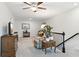 Open-concept living area with neutral tones, comfortable seating, and stylish decor at 2470 Crimson Downs Dr, Cumming, GA 30040