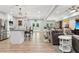An open-concept floor plan featuring a kitchen with a large living and dining area at 2470 Crimson Downs Dr, Cumming, GA 30040