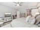 Spacious main bedroom with ample storage, stylish furnishings, and a tranquil ambiance for relaxation at 2470 Crimson Downs Dr, Cumming, GA 30040
