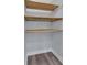 This closet has wood floors and 3 shelves at 3049 Highway 411 Ne, White, GA 30184