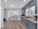 Bright kitchen with sleek cabinets, stainless steel appliances, and open floor plan at 3049 Highway 411 Ne, White, GA 30184