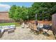 Outdoor space featuring furniture, grill and mature landscaping at 4590 Hastings Dr, Cumming, GA 30041