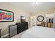 Bright bedroom with a TV, a mini fridge, and access to a walk-in closet at 4590 Hastings Dr, Cumming, GA 30041