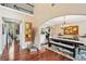 Elegant dining room with hardwood floors, high ceilings, and an open view to the living room at 4590 Hastings Dr, Cumming, GA 30041