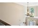 Grand foyer with a chandelier and view of the front entrance at 4590 Hastings Dr, Cumming, GA 30041