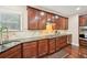 Well-equipped kitchen with stainless steel appliances, granite countertops, and ample cabinet space at 4590 Hastings Dr, Cumming, GA 30041