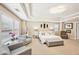 Spacious main bedroom with recessed lighting, seating and many windows at 4590 Hastings Dr, Cumming, GA 30041