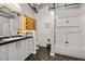 A bathroom is equipped with a shower and white vanity with a black countertop at 878 Peachtree Ne St # 431, Atlanta, GA 30309