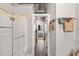 Modern bathroom featuring a walk in shower and views to the Primary bedroom at 878 Peachtree Ne St # 431, Atlanta, GA 30309
