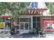 Inviting building entrance with modern architectural details and lush greenery, enhancing curb appeal and creating a welcoming first impression at 878 Peachtree Ne St # 431, Atlanta, GA 30309