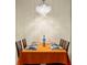 Dining room with seating for six under a bright chandelier at 878 Peachtree Ne St # 431, Atlanta, GA 30309