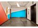 Hallway with modern lighting leading to a residential unit's entryway at 878 Peachtree Ne St # 431, Atlanta, GA 30309