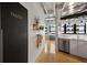 Modern kitchen features stainless steel appliances, pantry, and concrete beam ceiling at 878 Peachtree Ne St # 431, Atlanta, GA 30309