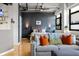 Comfortable living room featuring exposed ductwork with view of the bedroom at 878 Peachtree Ne St # 431, Atlanta, GA 30309