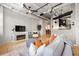 Cozy living room featuring a fireplace, sleek furniture, and hardwood floors at 878 Peachtree Ne St # 431, Atlanta, GA 30309