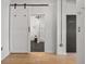 A pantry door is next to a sliding door and bathroom at 878 Peachtree Ne St # 431, Atlanta, GA 30309