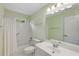 Bathroom features a shower/tub, vanity, toilet and a large mirror at 210 Wentworth Ter, Alpharetta, GA 30022