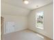 Carpeted bedroom with a window showcasing the neighborhood at 210 Wentworth Ter, Alpharetta, GA 30022