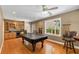 Game room with a pool table, bar area, and natural light from the window at 210 Wentworth Ter, Alpharetta, GA 30022