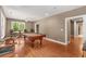 A game room with hardwood floors, a pool table, and an outside view at 210 Wentworth Ter, Alpharetta, GA 30022