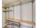 Spacious walk-in closet features wire shelves and storage baskets at 210 Wentworth Ter, Alpharetta, GA 30022