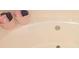 A close-up of the corner tub with pink organizers at 213 Whistle Way, Locust Grove, GA 30248