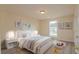Bedroom with a window and rug at 213 Whistle Way, Locust Grove, GA 30248