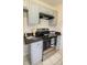 Kitchen featuring stainless steel appliances and sleek countertops at 213 Whistle Way, Locust Grove, GA 30248