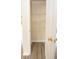Pantry with wooden laminate flooring and adjustable white wire shelving at 213 Whistle Way, Locust Grove, GA 30248