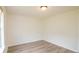 Bright and airy room with hardwood floors and a window for natural light at 213 Whistle Way, Locust Grove, GA 30248