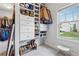 Walk-in closet featuring custom shelves and drawers for optimized shoe and clothing storage at 2358 Well Springs Dr, Buford, GA 30519