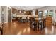 Spacious kitchen with dark wood cabinets and eat-in breakfast bar at 2358 Well Springs Dr, Buford, GA 30519
