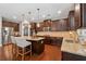 Kitchen with stainless steel appliances, center island, and ample counter space at 2358 Well Springs Dr, Buford, GA 30519