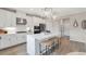 Bright kitchen with white cabinets, stainless steel appliances, pendant lighting, and center island at 3198 Shirecrest Ln, Dacula, GA 30019