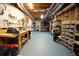 A well-organized basement workshop with ample storage and workbench space, perfect for DIY projects and hobbies at 3235 Munsey Ct, Cumming, GA 30041