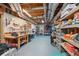 Spacious basement featuring exposed ceiling and an abundance of storage and workspace at 3235 Munsey Ct, Cumming, GA 30041