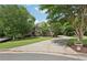 Charming home with beautiful landscaping, mature trees, and long driveway in a desirable neighborhood at 3235 Munsey Ct, Cumming, GA 30041