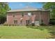 Lovely brick home with a large, grassy backyard at 3235 Munsey Ct, Cumming, GA 30041