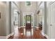 Inviting foyer with hardwood floors and a clear view of the home's interior at 3235 Munsey Ct, Cumming, GA 30041