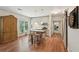 Bright kitchen boasts island with seating, shaker cabinets, and stainless steel appliances at 3235 Munsey Ct, Cumming, GA 30041
