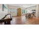 Cozy kitchenette featuring a small island with seating, modern appliances, and a nearby shuffleboard table at 3235 Munsey Ct, Cumming, GA 30041