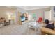 Open living room with desk, media center, vaulted ceiling and neutral decor at 3235 Munsey Ct, Cumming, GA 30041
