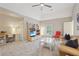 Spacious living room with bright lighting, modern TV, and comfortable seating for a Gathering at 3235 Munsey Ct, Cumming, GA 30041