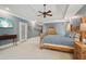 Expansive primary bedroom featuring sitting area, tray ceiling, and ensuite access at 3235 Munsey Ct, Cumming, GA 30041