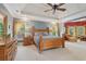 Large main bedroom features trey ceilings, and large windows with lots of natural light at 3235 Munsey Ct, Cumming, GA 30041