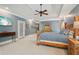Spacious main bedroom features trey ceiling, large windows, and ensuite bath at 3235 Munsey Ct, Cumming, GA 30041