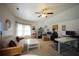 Spacious home office features vaulted ceilings, ample desks and storage space, perfect for a productive work environment at 3235 Munsey Ct, Cumming, GA 30041