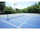 View of community tennis courts at 3235 Munsey Ct, Cumming, GA 30041