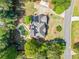 Beautiful aerial view of a home with a private backyard pool, deck, and landscaped yard at 5247 Hayden Farms Dr, Powder Springs, GA 30127